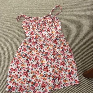 A pink floral dress that fits wonderfully
